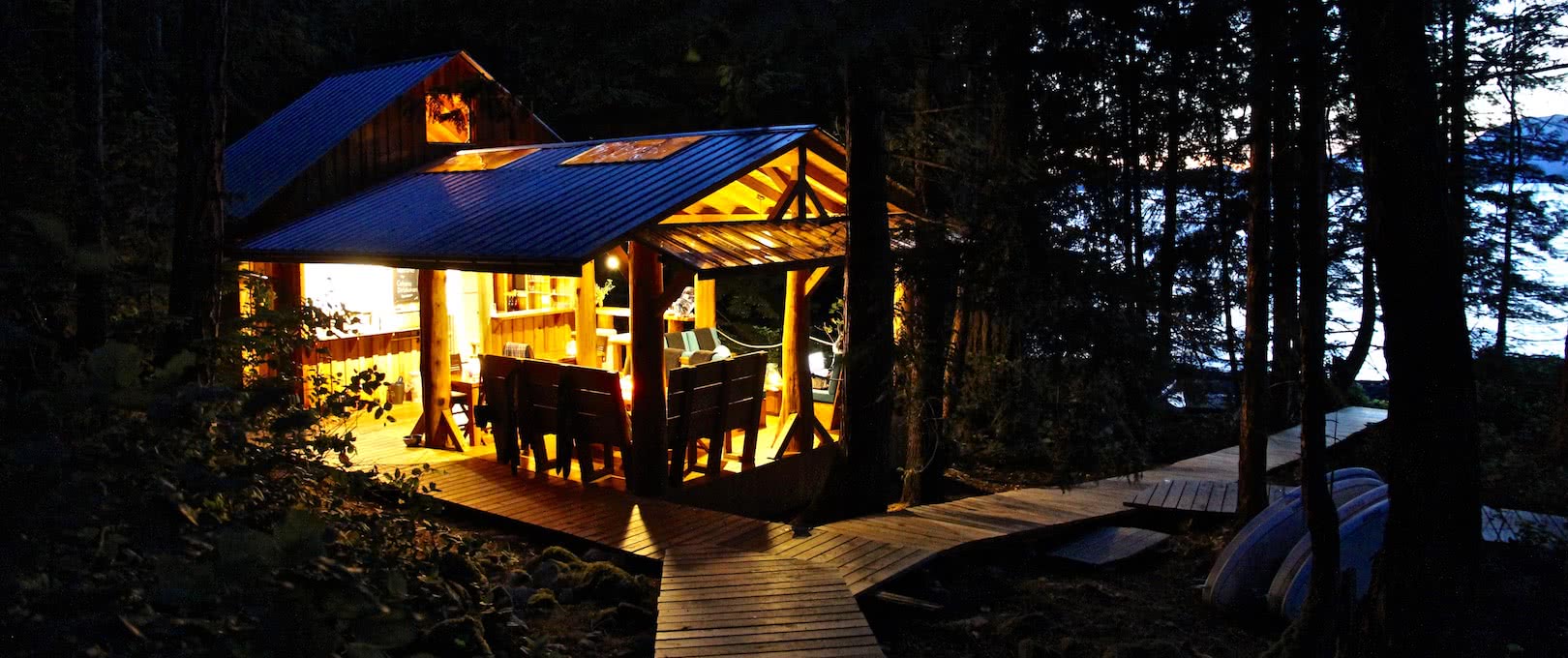 Our British Columbia eco resort lit up in the evening light