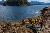 A kayak group launching at Cabana Desolation Eco Resort