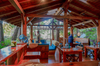 A man standing in the morning light in the Cabana Cafe