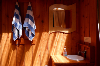 Thoughtful touches at the resort inclusng beach towels, sinks and handcrafted mirrors outside the cabana